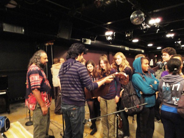 Kids Coming up to meet Homayoun and Abbos after Charter School performance